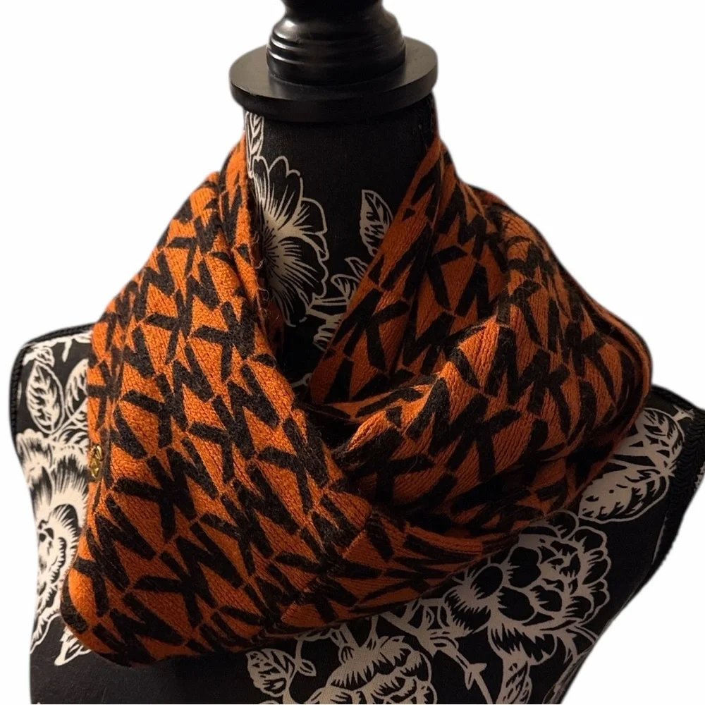 Michael Kors monogrammed, orange and black infinity scarf